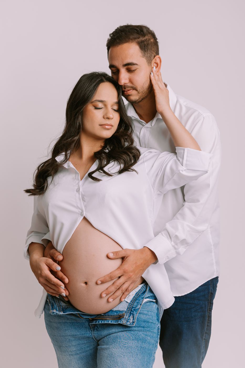 Expecting couple in studio, maternity session by Cape Coral maternity photographer Ana Rousseau